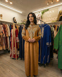 majlis gown golden-brown / bronze color.